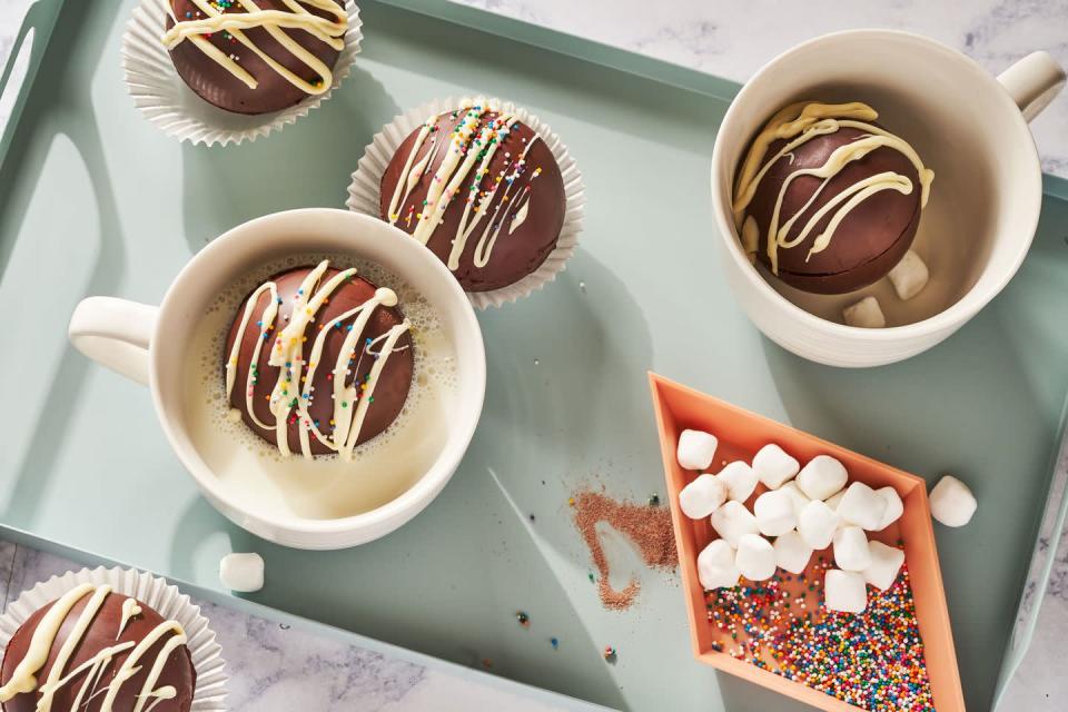 <p>ICYMI: Chocolate molds are filled with homemade <a href="https://www.delish.com/cooking/recipe-ideas/recipes/a50303/best-hot-chocolate-recipe/" rel="nofollow noopener" target="_blank" data-ylk="slk:hot cocoa" class="link ">hot cocoa</a> mix and marshmallows that explode after being dropped into hot milk. Although they <em>are</em> extremely fun to watch unfold, it's not just a novelty thing. The melted chocolate, along with the hot chocolate mix, makes the <em>creamiest</em> drink.</p><p>Get the <strong><a href="https://www.delish.com/cooking/recipe-ideas/a35549302/hot-chocolate-bombs-recipe/" rel="nofollow noopener" target="_blank" data-ylk="slk:Hot Chocolate Bombs recipe" class="link ">Hot Chocolate Bombs recipe</a></strong>.</p>