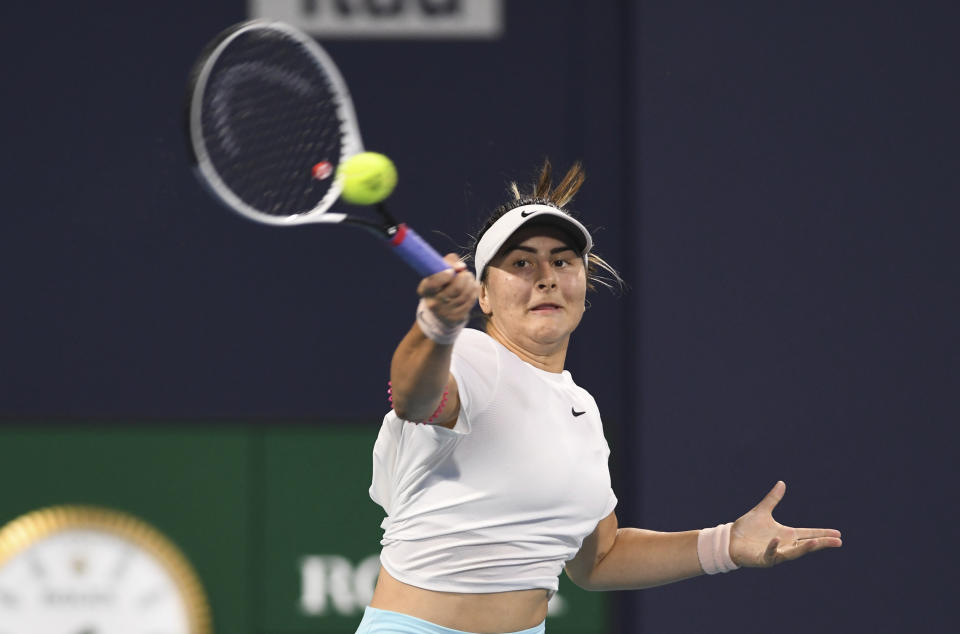 Bianca Andreescu, of Canada, returns to Sara Sorribes Tormo, of Spain, during the Miami Open tennis tournament Wednesday March 31, 2021, in Miami Gardens, Fla. (AP Photo/Taimy Alvarez)