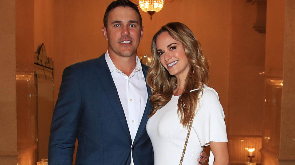 Brooks Koepka and Jena Sims. (Photo by Andrew Redington/Getty Images)