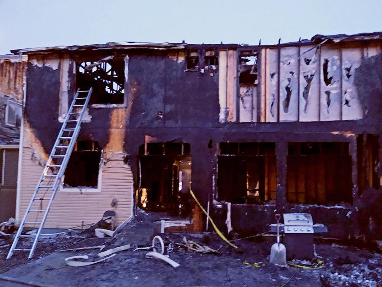 This photo from the Denver Fire Department shows the house where five people were found dead in fire that authorities suspect was intentionally set: (2020 The Associated Press)
