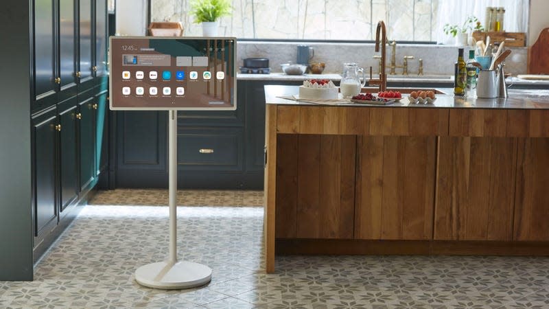 The original LG StanbyME with its tall display stand in a kitchen.
