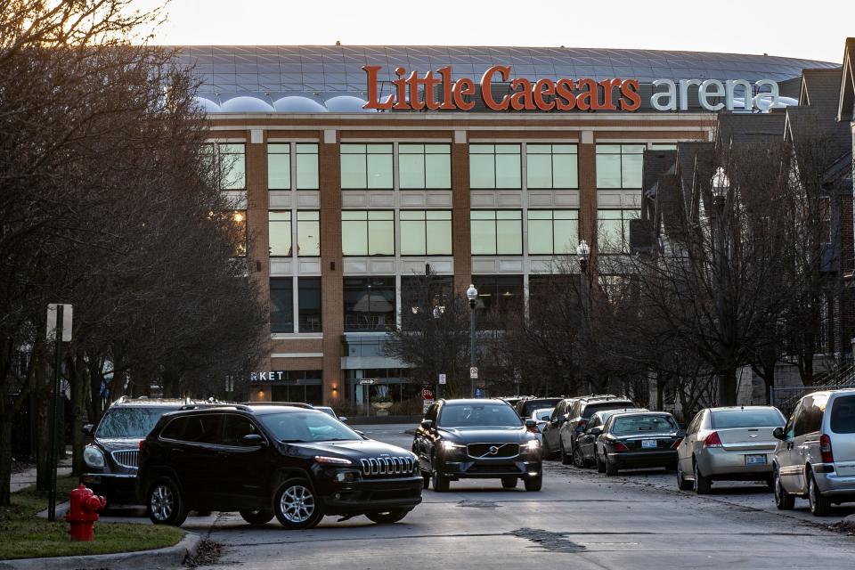 Parking along Adelaide Street in Brush Park near Little Caesars Arena near Downtown Detroit on Tuesday, Dec. 19, 2023. Detroit is establishing four new residential parking zones with daily enforcement that will begin one at a time from Jan. 2 through February 2024.