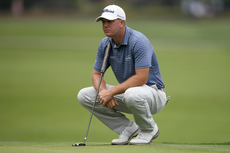 Tom Hoge lines up a putt on the fifth hole during the second round of the RBC Heritage golf tournament, Friday, April 19, 2024, in Hilton Head Island, S.C. (AP Photo/Chris Carlson)
