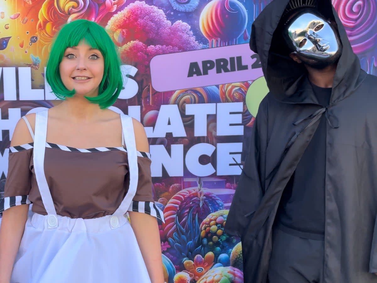 Kirsty Paterson as the sad Oompa Loompa alongside a fellow cast member playing the Unknown at the Willy Wonka Experience in Downtown Los Angeles, California on 28 April.  (Olivia Hebert)