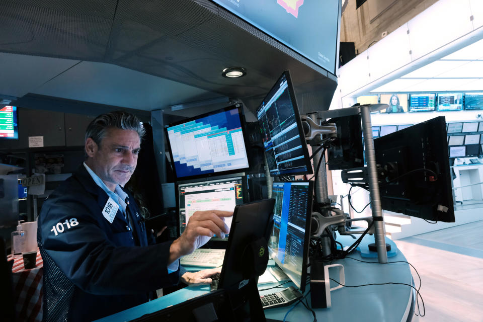 NEW YORK, NEW YORK - JUNE 14: Traders work on the floor of the New York Stock Exchange (NYSE) on June 14, 2023 in New York City. Markets fell over 200 points following news that the Federal Reserve announced Wednesday that it was keeping its interest rate at around 5% - the first time it has not raised the rate in over a year. (Photo by Spencer Platt/Getty Images)