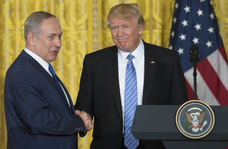 US President Donald Trump and Israeli Prime Minister Benjamin Netanyahu in the White House, February 15, 2017. Trump visits Jerusalem Monday to seek ways to achieve Israeli-Palestinian peace which he says could be easier than