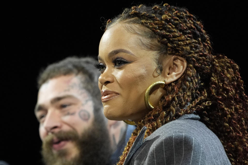 Andra Day listens during a news conference ahead of the Super Bowl 58 NFL football game Thursday, Feb. 8, 2024, in Las Vegas. (AP Photo/John Locher)