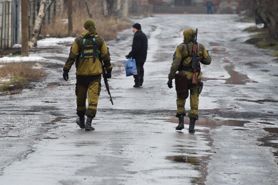 Pro-Russian fighters patrol Makiivka Donetsk Ukraine