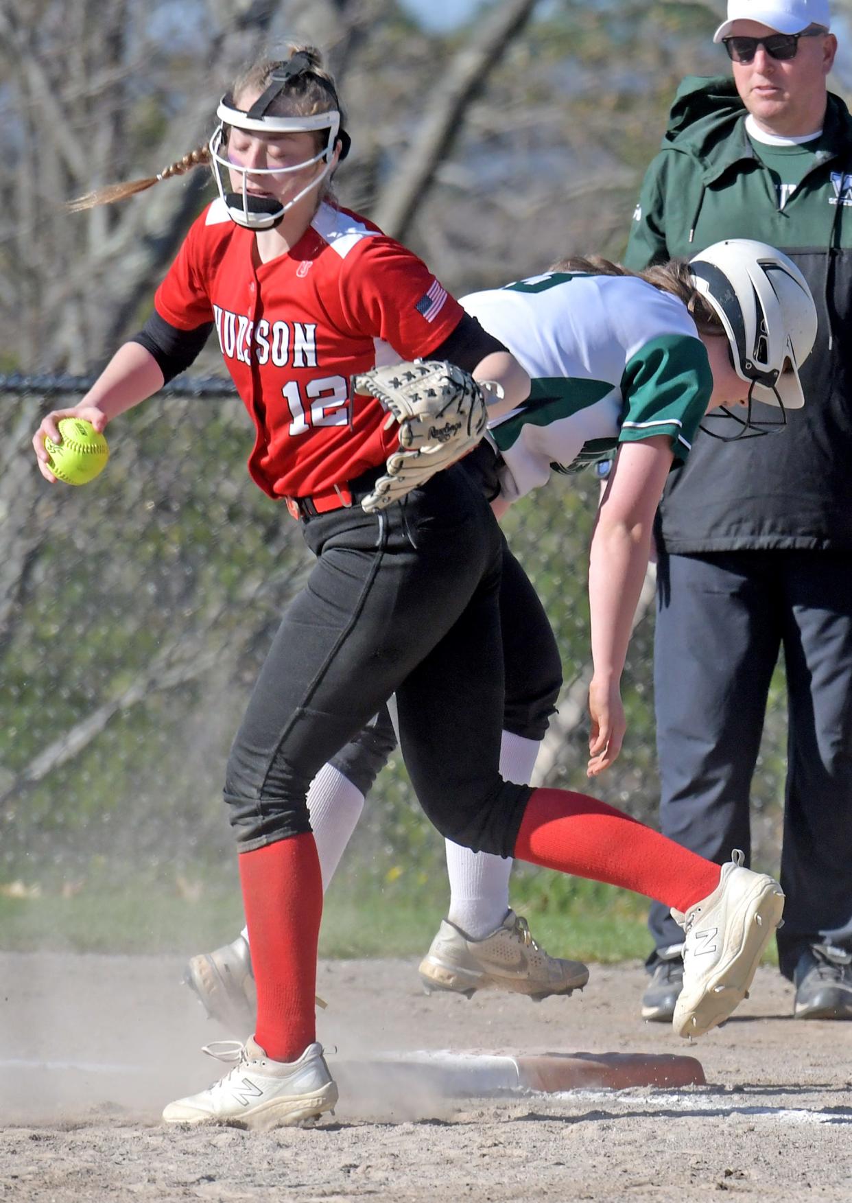 Wachusett's Riley Quirk is doubled up at first base by Hudson's Samantha Collette, after Wachusett's Gracie Granger lined out to Hudson centerfielder Sarah Korowski, who turned the double play.