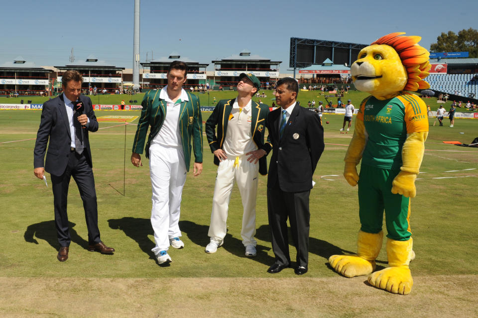 Team Captains, Graeme Smith of South Africa and Michael Clarke of Australia at the toss during day one of the First Test match between South Africa and Australia at SuperSport Park on February 12, 2014 in Centurion, South Africa. (Photo by Lee Warren/Gallo Images/Getty Images)