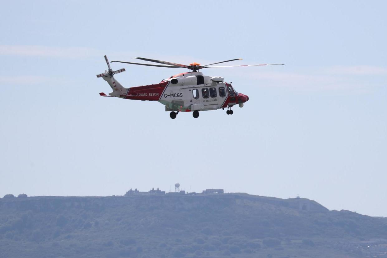 A file picture of a HM Coastguard helicopter: PA