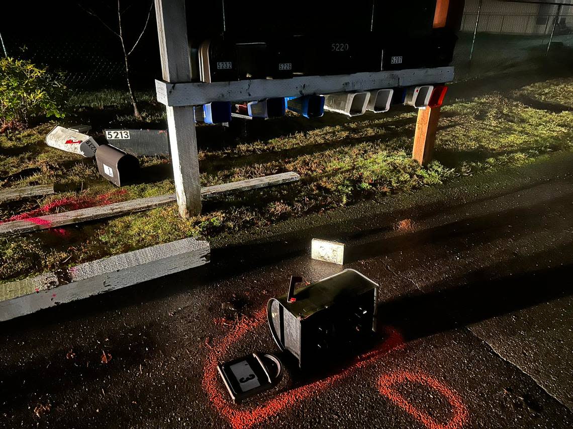 A mailbox lies in the road in a neighborhood near Port Orchard. In a Facebook post, Kitsap County Sheriff’s Office said detectives were investigating whether mail thefts in the area were connected to the fatal shooting of 31-year-old Richard Utaifeau Taii.