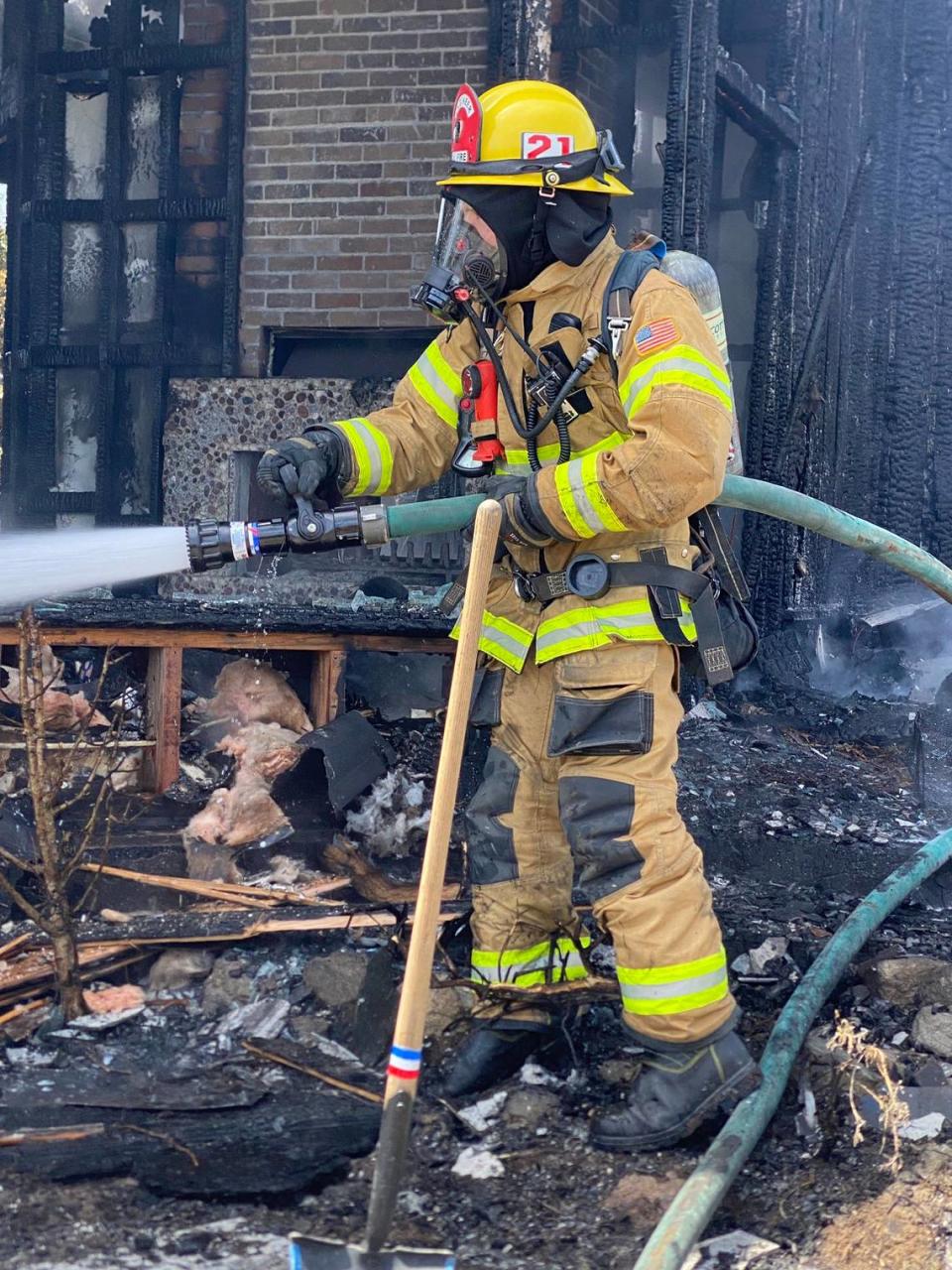 Firefighters respond to a fire that fully engulfed a home near the 600 block of Santa Lucia Avenue and Second Street on May 21, 2024.