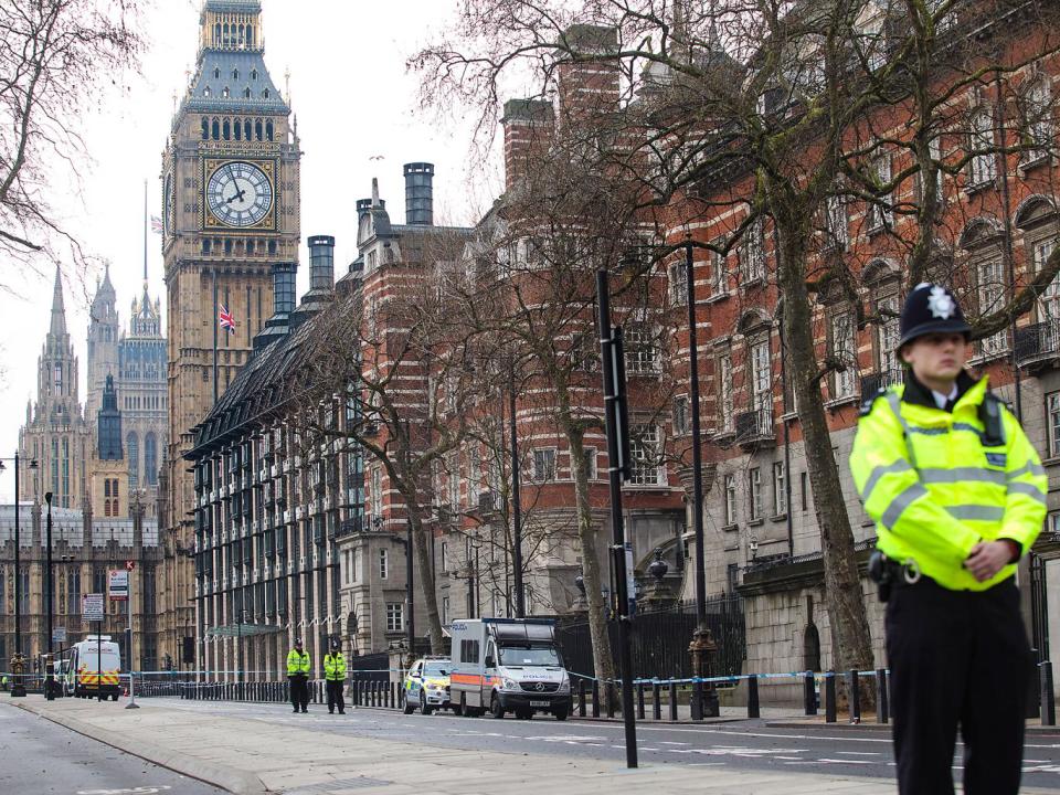 Police officers stand guard on Victoria Embankment following yesterday's attack in London, England (ge)