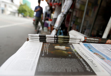 The final issue of The Cambodia Daily newspaper is seen in a store along a street in Phnom Penh, Cambodia, September 4, 2017. REUTERS/Samrang Pring