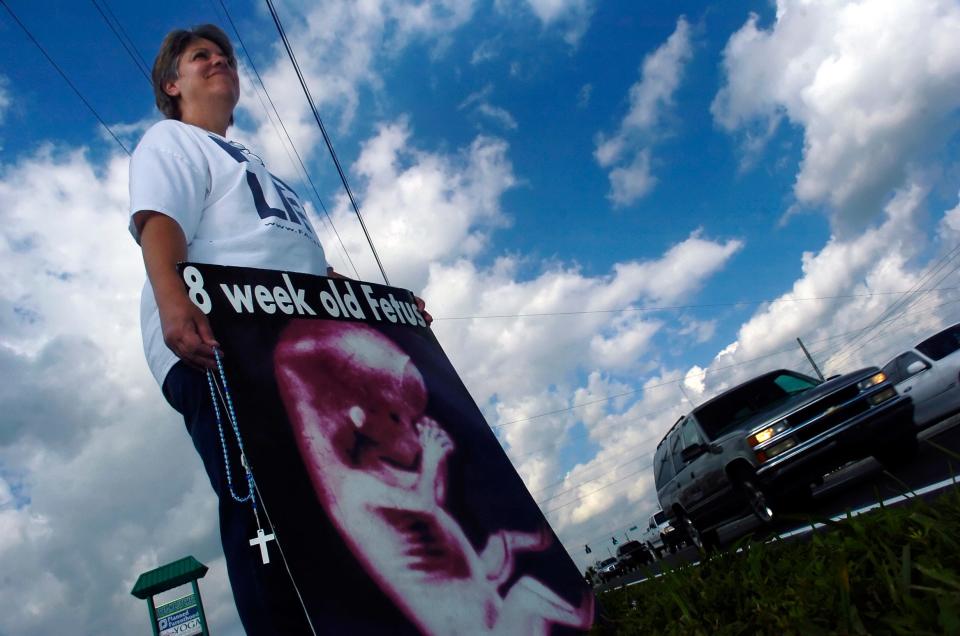 Pauline Paulick, who runs a teens for life group at the St. Lucie Catholic Church, in Port St. Lucie, was one of about 30 protestors from the group Sanctity of Human Life, which held a peaceful demonstration on the sidewalk in front of the Planned Parenthood Monday afternoon Jan. 22, 2007, along U.S. 1 in Stuart, north of the Roosevelt Bridge.