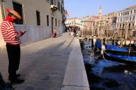 FILE PHOTO: Gondolas are seen in Grand Canal during an exceptionally low tide in the lagoon city of Venice