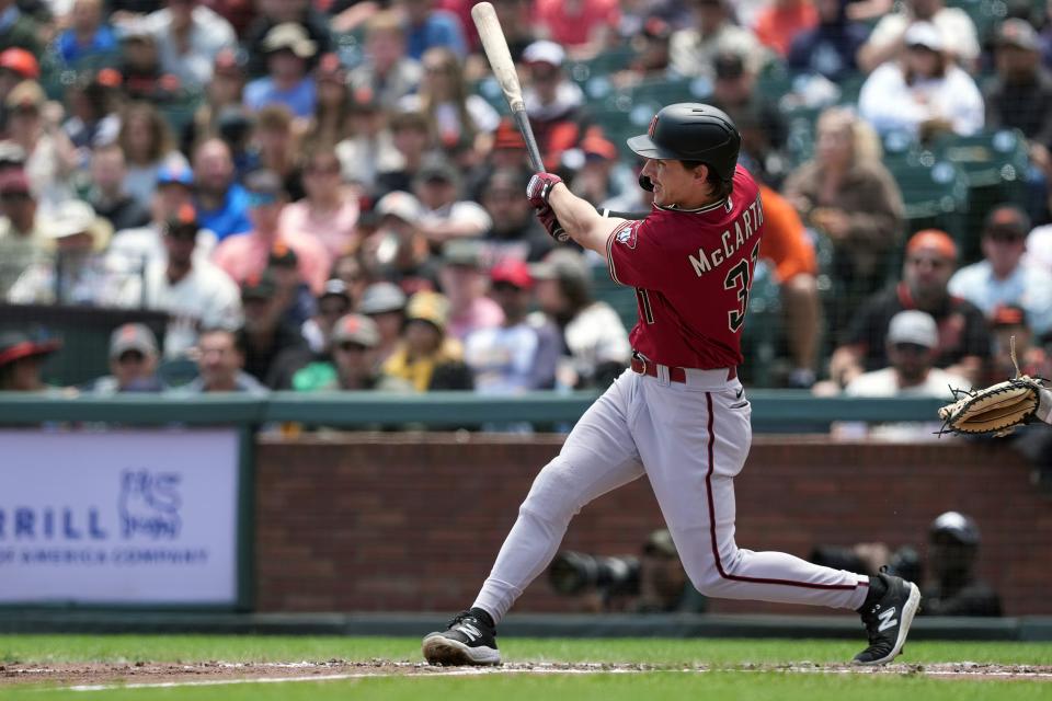 Arizona Diamondbacks right fielder Jake McCarthy (31) hits an RBI single against the San Francisco Giants during the second inning at Oracle Park in San Francisco on June 25, 2023.