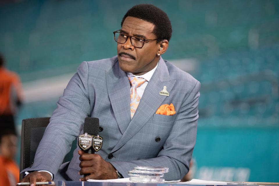 FILE - NFL Network analyst Michael Irvin speaks on air during the NFL Network's NFL GameDay Kickoff broadcast before the start of an NFL football game between the Baltimore Ravens and the Miami Dolphins, on Nov. 11, 2021, in Miami Gardens, Fla.