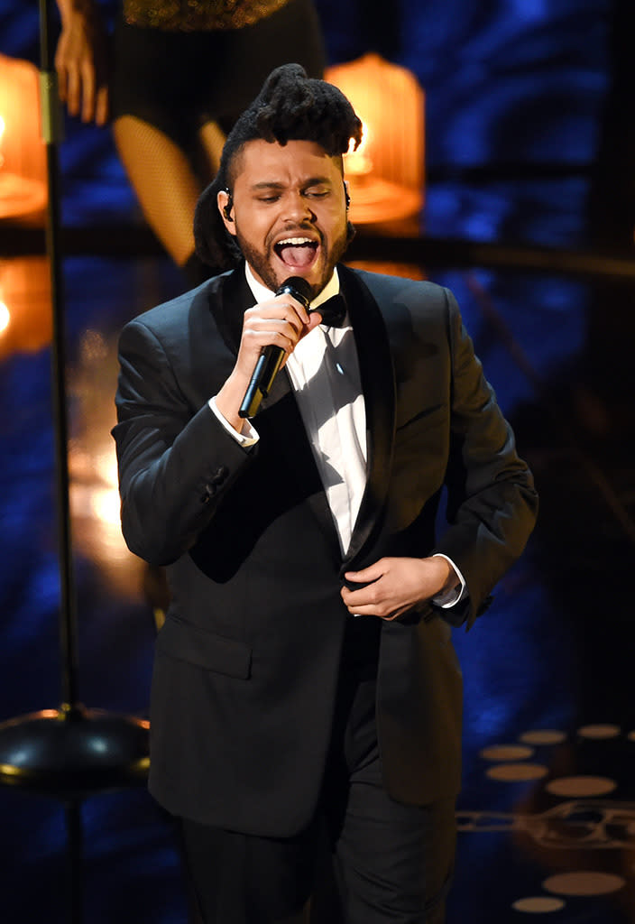 The Weeknd performs onstage during the 88th Annual Academy Awards at the Dolby Theatre on February 28, 2016 in Hollywood, California.  