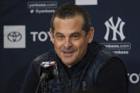 New York Yankees manager Aaron Boone responds to a question during a news conference at the American League Wild Card Workout Day at Fenway Park, Monday, Oct. 4, 2021, before Tuesday's American League Wild Card game against the Boston Red Sox in Boston. (AP Photo/Mary Schwalm)