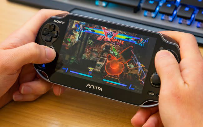 The PlayStation Vita in the hands of a gamer