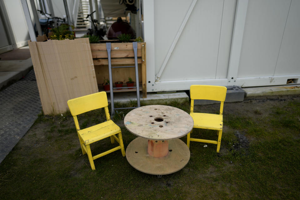 A childrens play area made from recycled items in a makeshift garden at the Ukraine village, which has been constructed for Ukrainian families fleeing the war, in Linkeroever, Belgium, Friday, March 17, 2023. Despite the warm welcome for millions of Ukraine refugees on European Union soil since the Russian invasion, EU officials said Tuesday, June 6, 2023 that there are some fears of wavering support caused by a bad economy hitting poor families especially and the creeping influence of Russian propaganda. (AP Photo/Virginia Mayo)