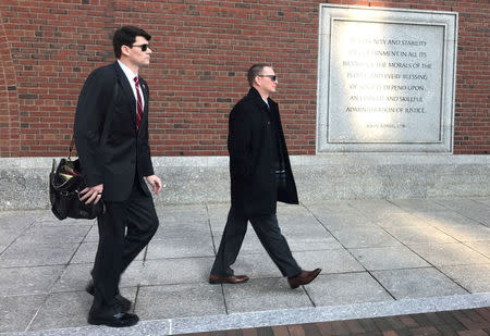 FILE PHOTO: Timothy Sullivan (R), chief of staff of intergovernmental affairs for the city of Boston enters federal court in Boston, Massachusetts, U.S., December 4, 2017. Photo taken December 4, 2017. REUTERS/Nate Raymond'/File Photo