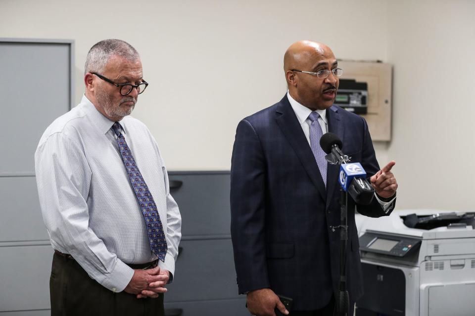 Mikel Oglesby, executive director of transit for the city of Detroit, right, speaks at a news conference to provide an update on the paratransit program, with G. Michael Staley, program manager for paratransit at the DDOT Administrative Building in Detroit on Tuesday, Feb. 28, 2023.