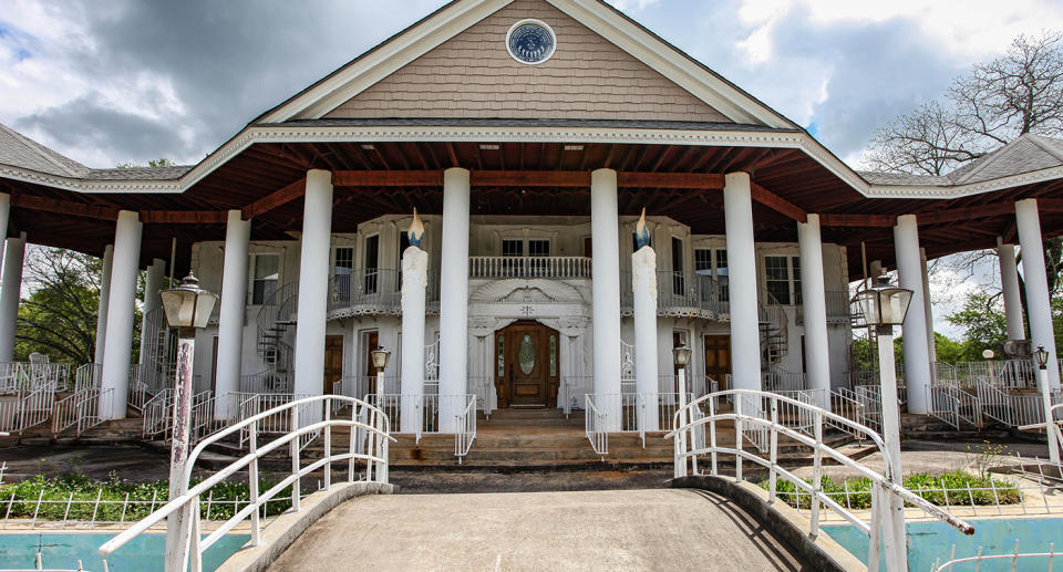 This building was referred to as ‘The Father’s House’ and was built for George Pike by the church members but remains unfinished. Source: Australscope/ Abandoned Southeast