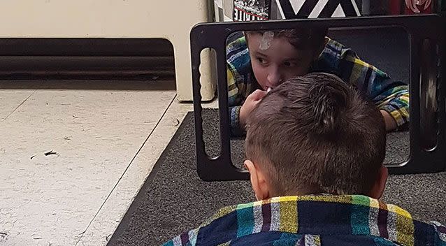 Mr Jakob takes about 90 minutes to cut the boy's hair. Source: Supplied