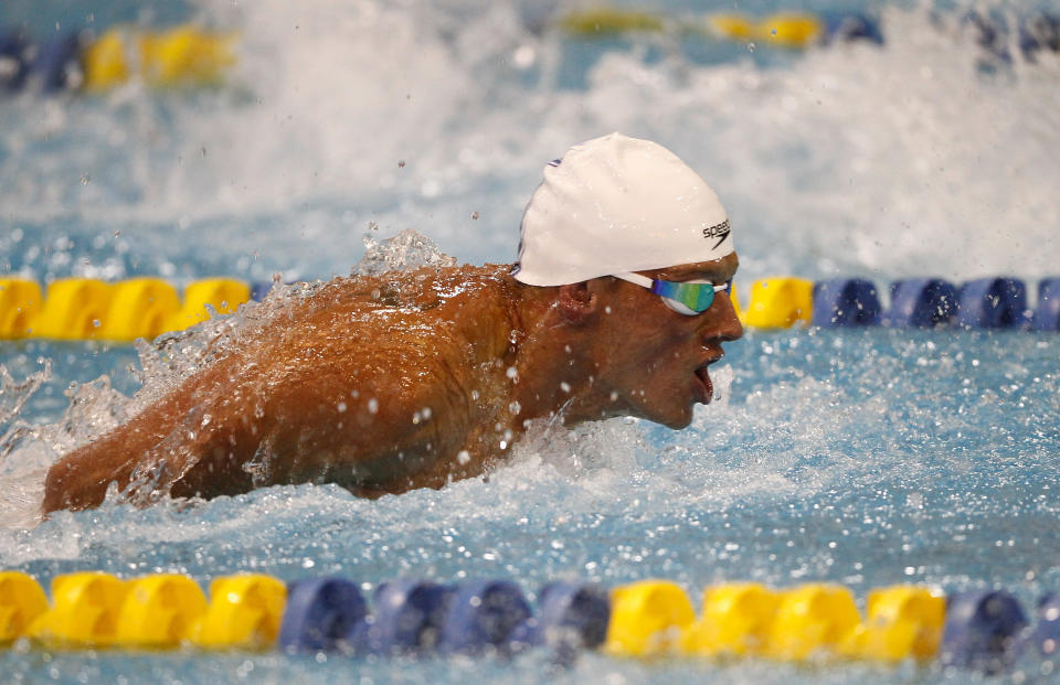 Ryan Lochte competes in the men's 50m butterfly final during the 2012 Charlotte UltraSwim Grand Prix at Mecklenburg County Aquatic Center on May 12, 2012 in Charlotte, North Carolina. (Photo by Streeter Lecka/Getty Images)