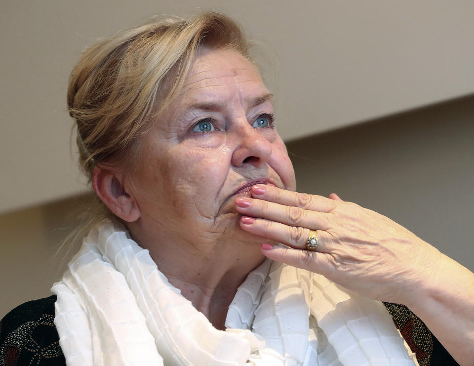 In this photo taken on May 15, 2019, Barbara Borowiecka, a survivor of alleged abuse as a minor by a prominent Solidarity-era priest gestures during an interview with The Associated Press. A documentary film with testimony by victims of clerical abuse in Poland is so harrowing that it has forced an unprecedented reckoning with the problem in one of Europe’s most deeply Catholic societies. In December, Borowiecka, 62, told Polish media about being abused when she was 11 by Henryk Jankowski, a prominent prelate in Lech Walesa’s anti-communist Solidarity movement in Gdansk, where a monument of him stood. (AP Photo/Czarek Sokolowski)