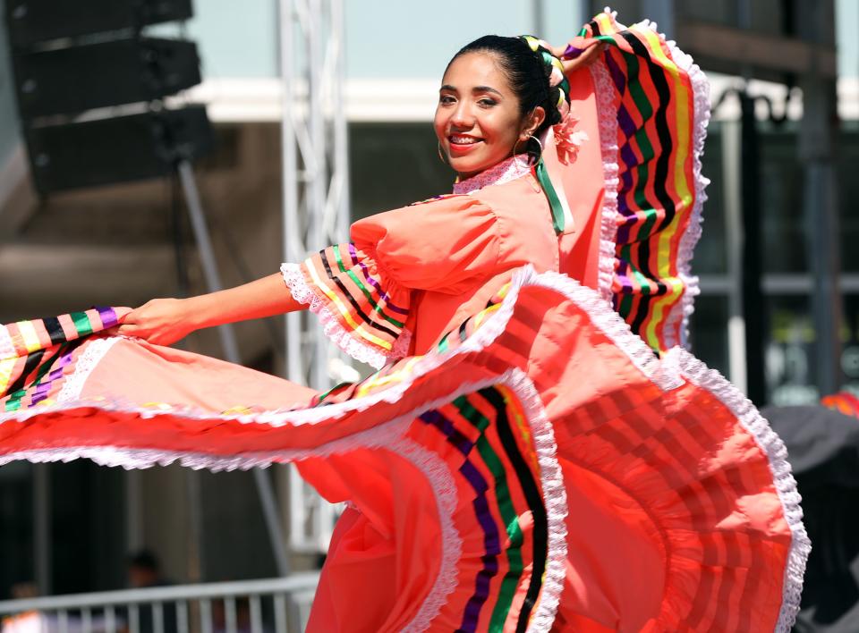 A dancer from the Quad Cities Ballet Folklorico performs.