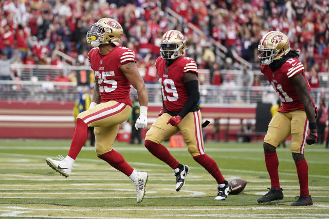 49ers rumble over threadbare Cardinals, enter playoffs on 10-game