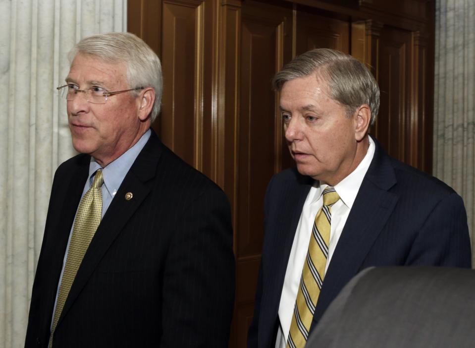 Senators Wicker and Graham walk into Senate chamber for budget vote on Capitol Hill in Washington