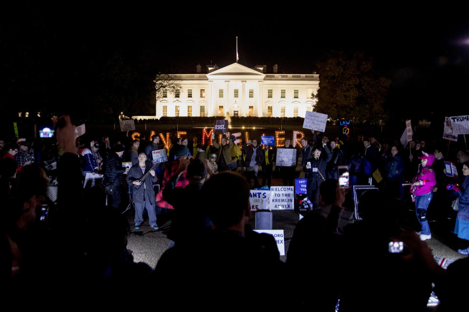 Protesters gather in front of the White House in Washington, Thursday, Nov. 8, 2018, as part of a nationwide "Protect Mueller" campaign demanding that Acting U.S. Attorney General Matthew Whitaker recuse himself from overseeing the ongoing special counsel investigation. (AP Photo/Andrew Harnik)