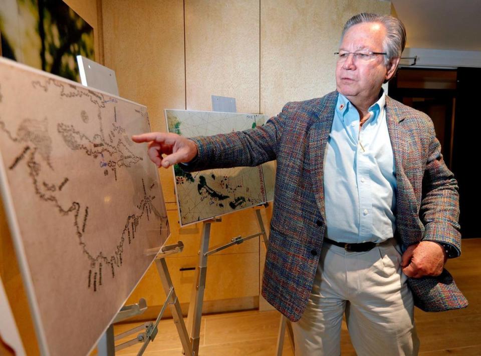 Map collector, Brian Schmitt, co-author of “The Florida Keys: A History Through Maps,” displays a map by Peter Martyr D’Anghiera, published in 1511, that shows the Florida coastline and what appear to be the Keys and the Dry Tortugas .