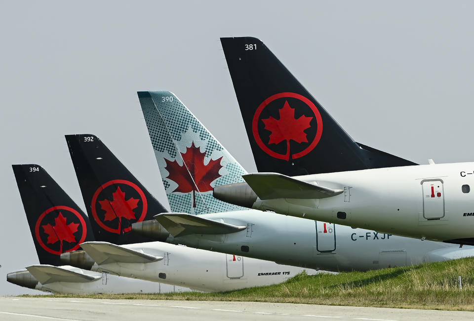 Air Canada says all direct flights to and from Tel Aviv will be cancelled through the end of the month. Air Canada planes park on the tarmac at Toronto Pearson International Airport on Wednesday, April 28, 2021. THE CANADIAN PRESS/Nathan Denette