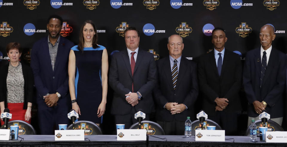 From left, Muffet McGraw, Tracy McGrady, Rebecca Lobo, Bill Self, Tom JernstedtMannie Jackson and Robert Hughes pose for a picture at the Basketball Hall of Fame news conference, Saturday, April 1, 2017, in Glendale, Ariz. (AP Photo/David J. Phillip)