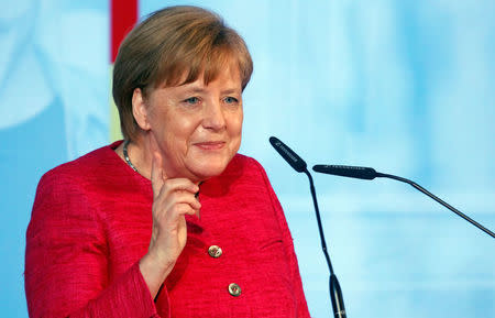 German Chancellor Angela Merkel speaks during the "70 Years of Social Market Economy" anniversary event at the Federal Ministry for Economic Affairs and Energy in Berlin, Germany, June 15, 2018. REUTERS/Michele Tantussi