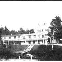 The beginning of the AuSable Club on Charles Brink Road dates back to 1922 when Dion Geraldine established the First National Fur Farms. The basis of the farm was to raise purebred cattle, hogs and fowl, as well as the production of fur-bearing animals.