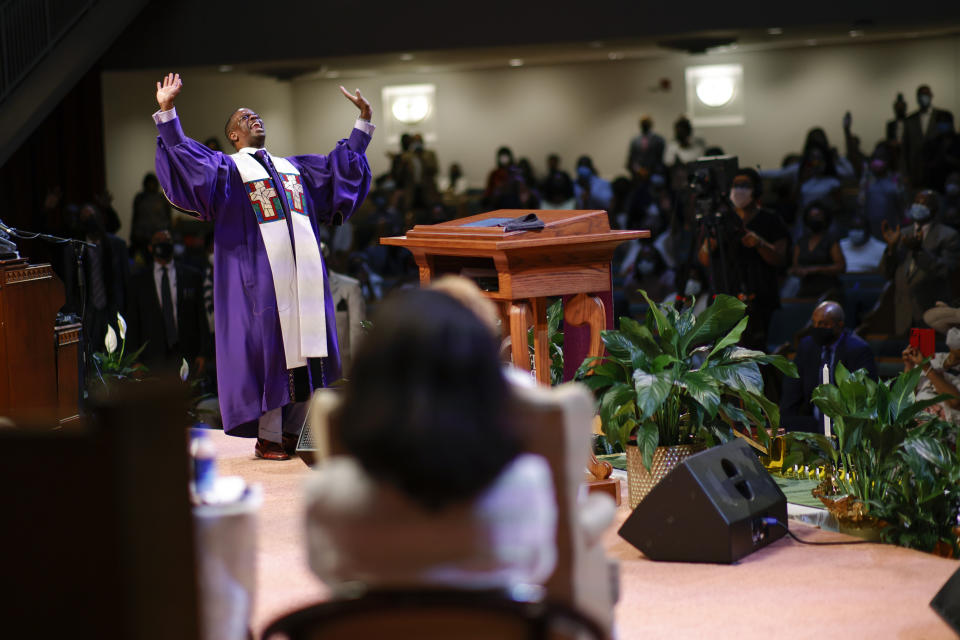 Rev. Dante Quick, preaches during a church service at the First Baptist Church of Lincoln Gardens on Sunday, May 22, 2022, in Somerset, N.J. Quick says he copes by taking time for “joy seeking” activities – like a nice restaurant meal, an Anita Baker concert, or joining his mother in watching her favorite TV show. He also now has a personal phone and a church phone “so I can put one down from time to time.” (AP Photo/Eduardo Munoz Alvarez)