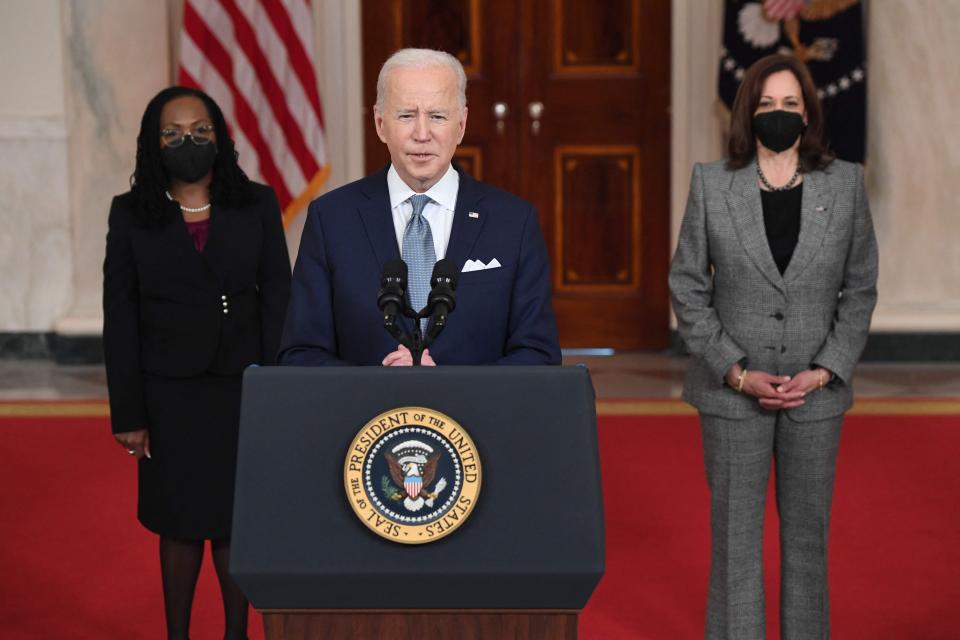 US President Joe Biden, with Vice President Kamala Harris (R), introduces his nominee for the US Supreme Court, Ketanji Brown Jackson (L), at the White House in Washington, DC, on February 25, 2022.