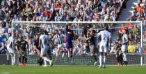 Britain Football Soccer - West Bromwich Albion v Southampton - Premier League - The Hawthorns - 8/4/17 Southampton's Fraser Forster punches the ball clear Reuters / Anthony Devlin Livepic