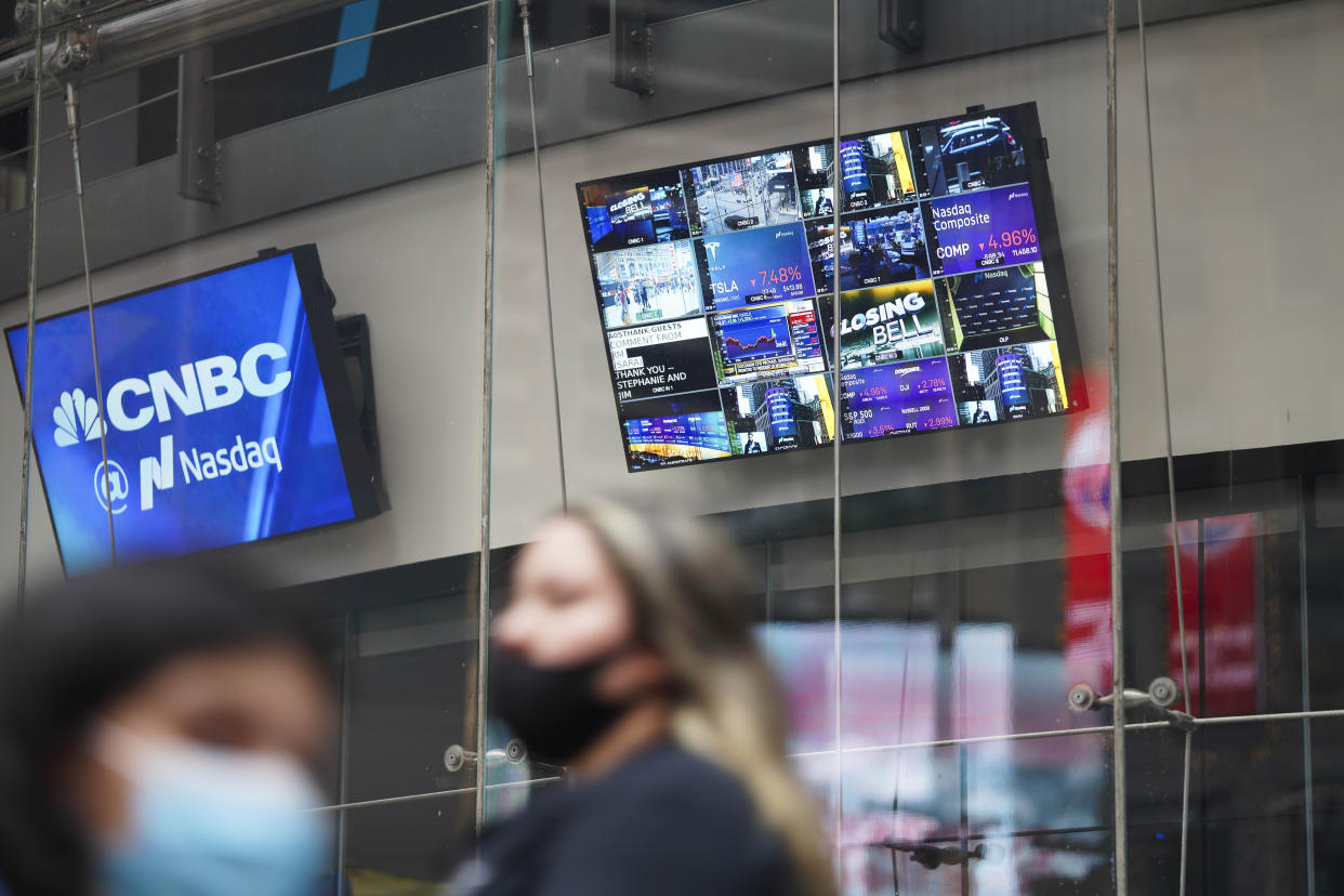 NEW YORK, Sept. 3, 2020  -- Pedestrians walk past electronic screens of the New York Stock Exchange (NYSE) in New York, the United States, Sept. 3, 2020.   U.S. stocks plunged on Thursday, as a steep sell-off in tech shares dragged down the market.     The Dow Jones Industrial Average fell 807.77 points, or 2.78 percent, to finish at 28,292.73. The 30-stock index shed more than 1,000 points, or about 3.5 percent, at the lows.     The S&P 500 fell 125.78 points, or 3.51 percent, to end at 3,455.06. The Nasdaq Composite Index sank 598.34 points, or 4.96 percent, to 11,458.10. (Photo by Wang Ying/Xinhua via Getty) (Xinhua/Wang Ying via Getty Images)