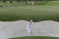 Sei Young Kim hits from the bunker on the 10th green during Round 1 of 2021 KPMG Women's PGA Championship at Atlanta Athletic Club in Johns Creek, Ga., Thursday, June 24, 2021. (Hyosub Shin/Atlanta Journal-Constitution via AP)