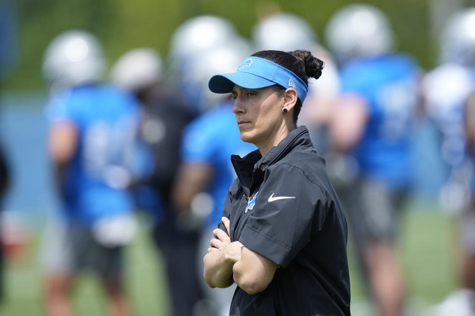 Detroit Lions Director of Sports Medicine Jill Costanza watches an NFL football practice, Tuesday, June 4, 2024, in Allen Park, Mich. Costanza’s interest in studying ACL injuries and passion for learning new ways to improve performance led the former high school basketball coach and PE teacher on a journey from college sports to the Army to the Air Force to the NFL. Now, she’s an asset for a team with Super Bowl aspirations. (AP Photo/Carlos Osorio)