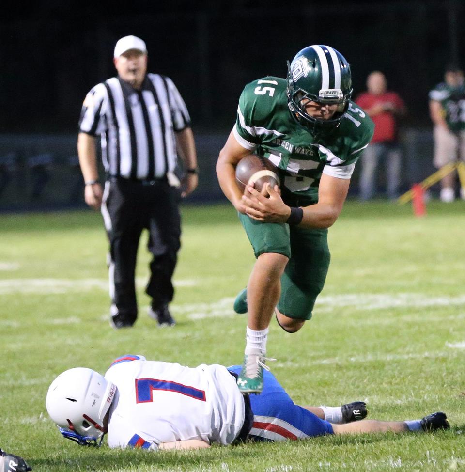 Senior quarterback Ryder Aubin and the Dover High School football team will visit Winnacunnet on Friday in the season opener for both teams.