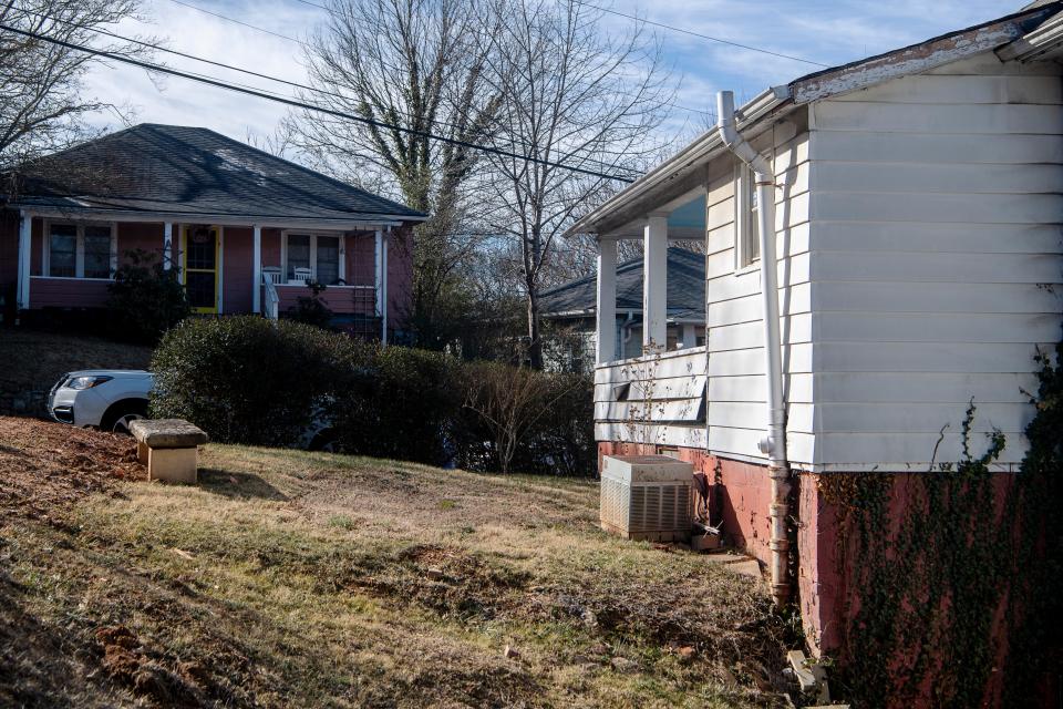 The Preservation Society of Asheville and Buncombe County plans to renovate a home on Grail Street, right.